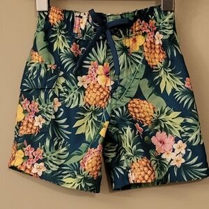 Brightly colored mesh lined swim trunks